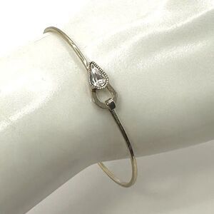 Gold tone rhinestone bangle bracelet